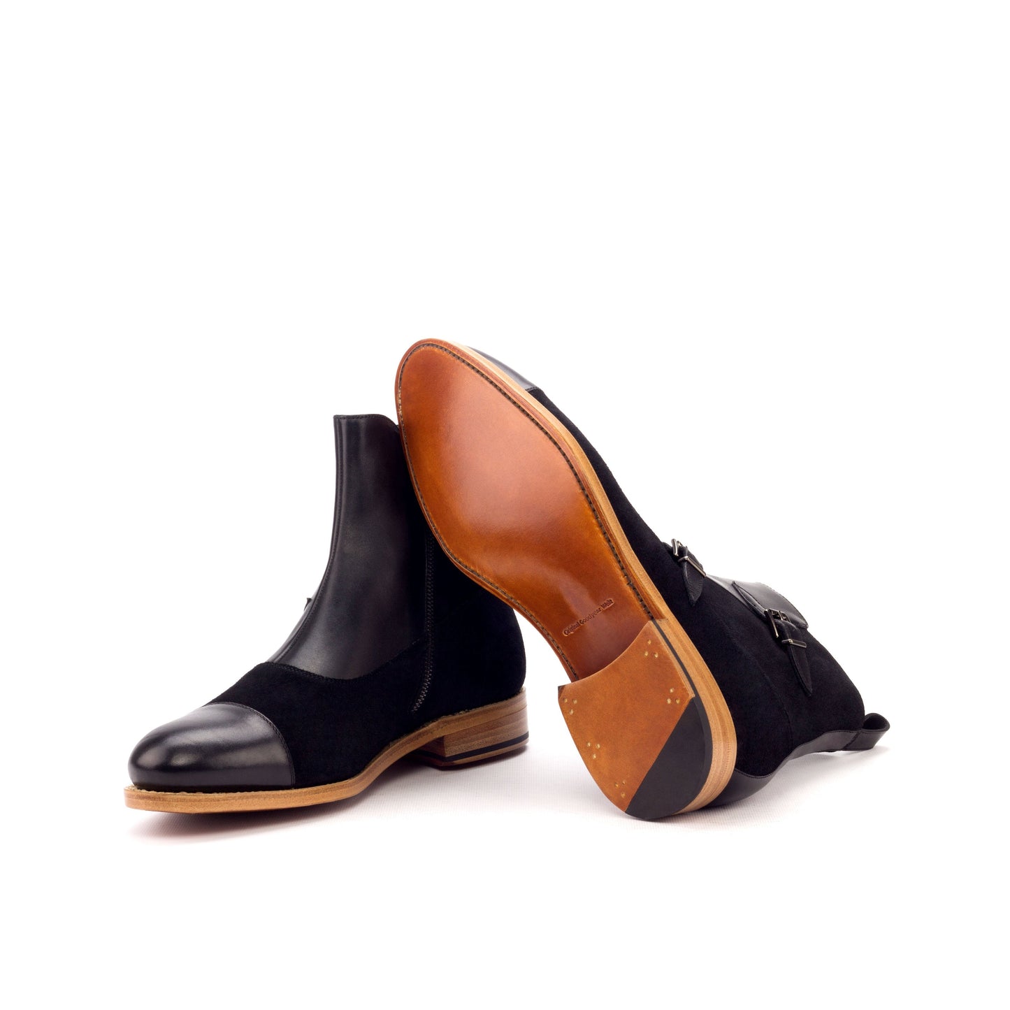 Double Buckle Boot in Black Lux Suede and Black Painted Box Calf showing cognac leather sole