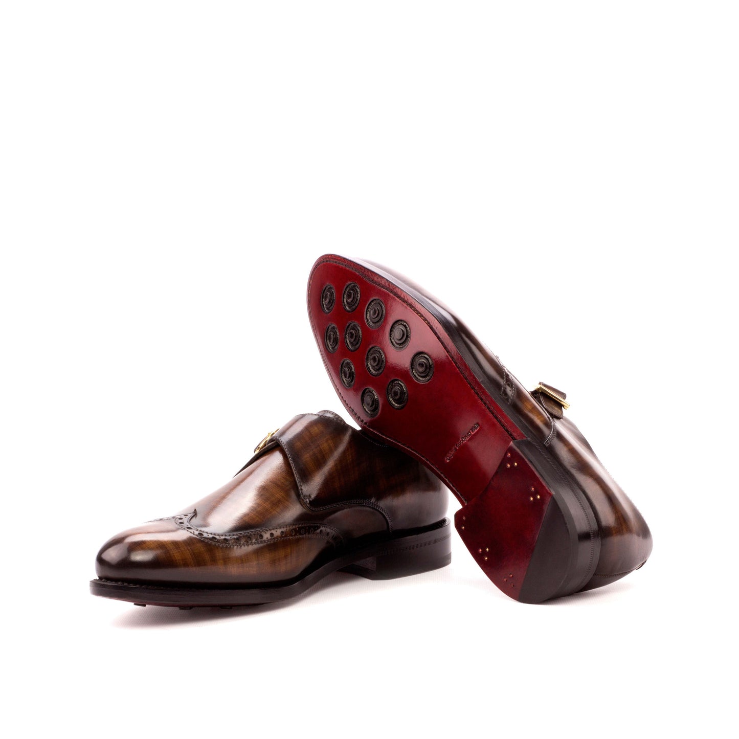 Single Monk Strap in Brown Patina Box Calf and Black Herringbone Fabric showing dark red leather sole with rubber button injections