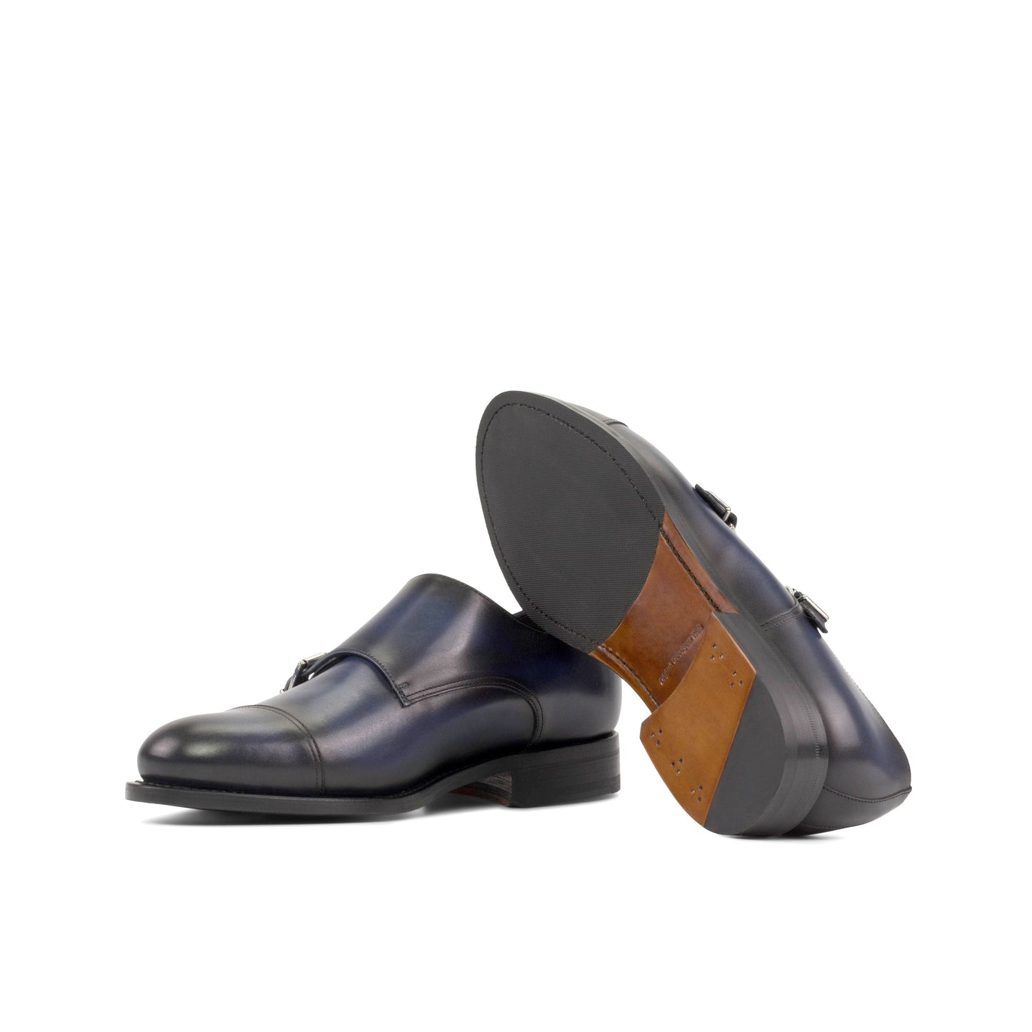 Double Monk Strap in Navy Painted Box Calf showing cognac leather and rubber combination sole
