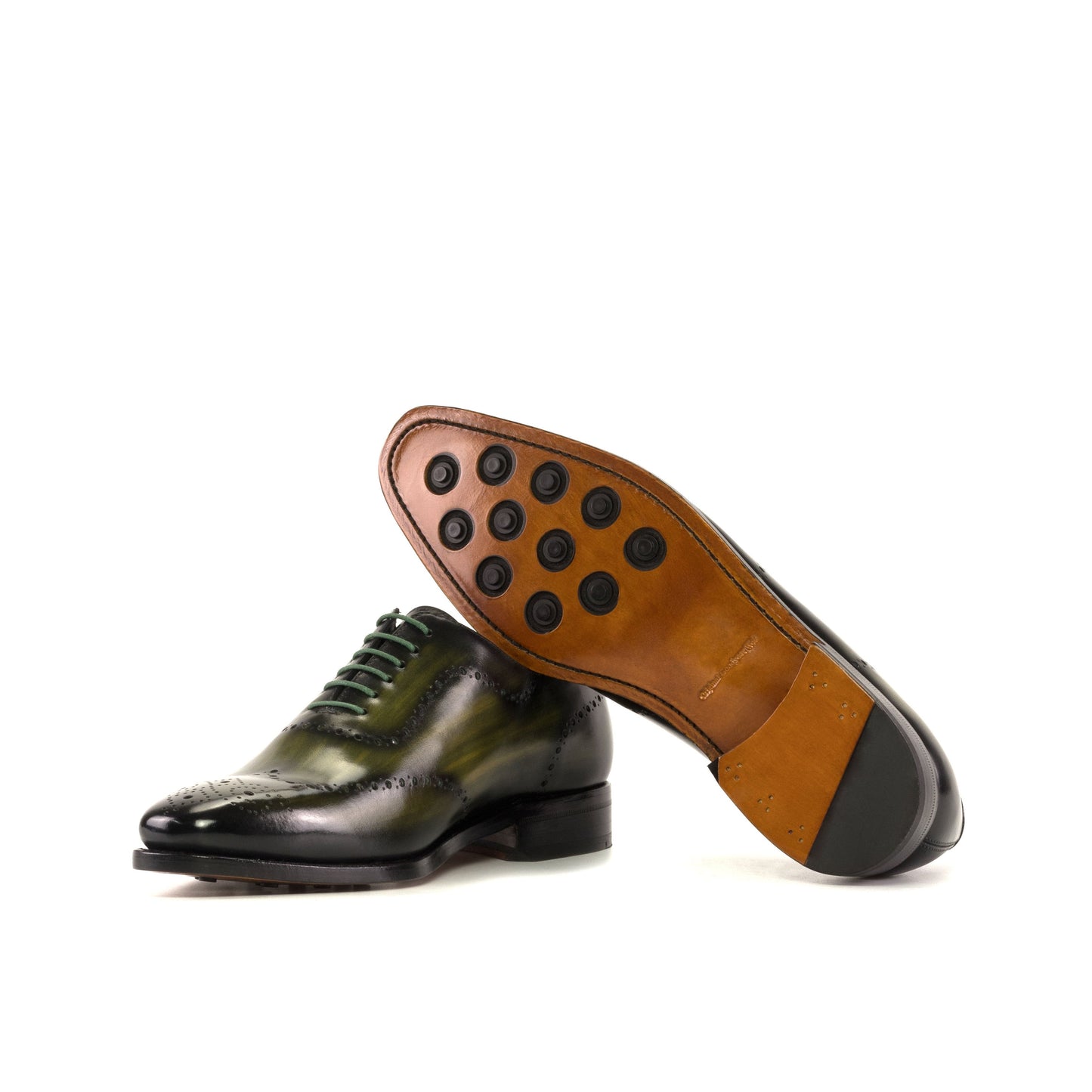 Wholecut Oxford in Khaki Patina Box Calf and Cognac Patina Box Calf showing cognac leather sole