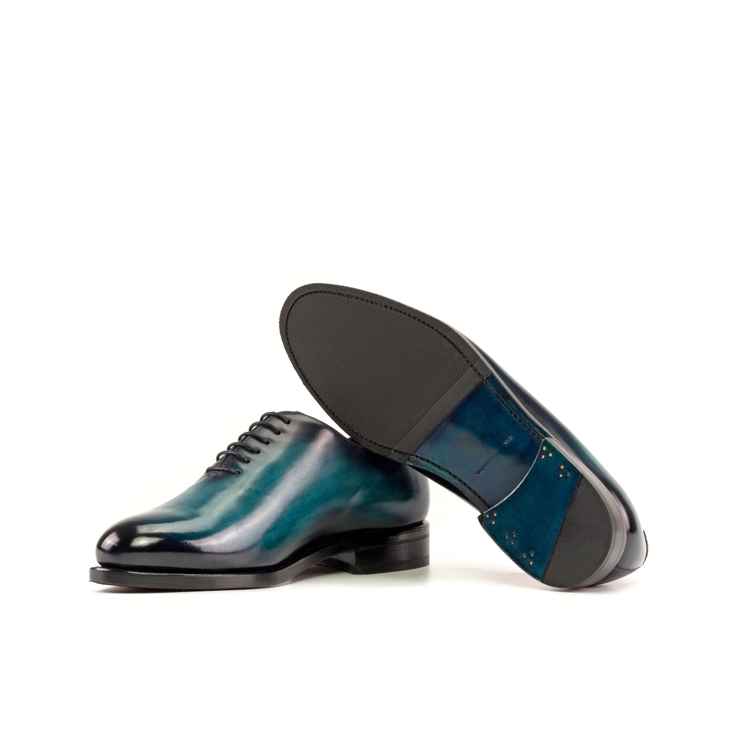 Wholecut Oxford in Turquoise Patina Box Calf showing turquoise leather sole