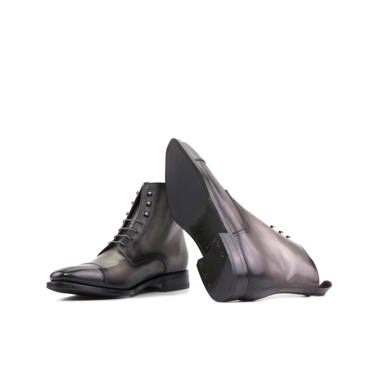 Jumper Boot in Grey Painted Box Calf showing forest green leather and rubber combination sole