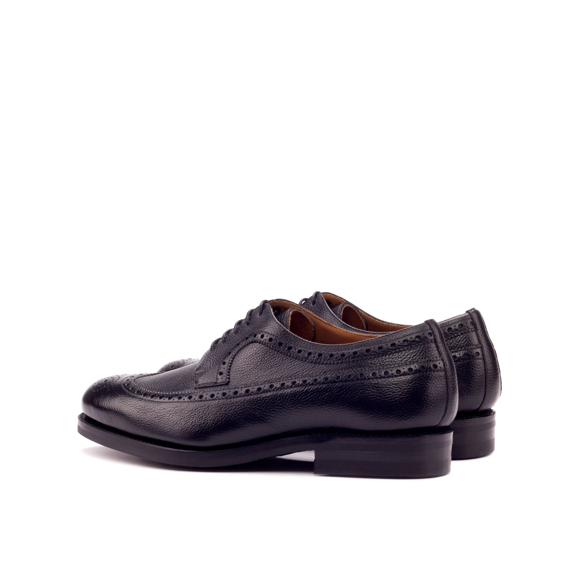 Long Wingtip Derby in Black Painted Full-Grain Box Calf, rear three-quarter view