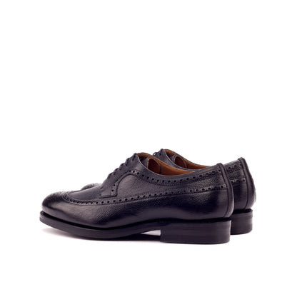 Long Wingtip Derby in Black Painted Full-Grain Box Calf, rear three-quarter view