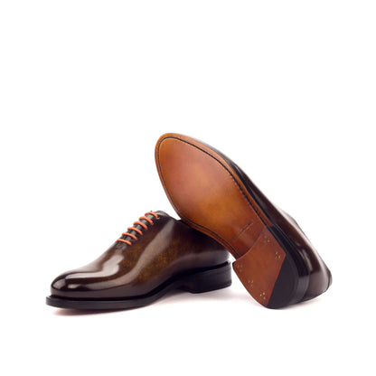 Wholecut Oxford in Cognac Marble Patina Box Calf and Denim Marble Patina Box Calf showing cognac leather sole