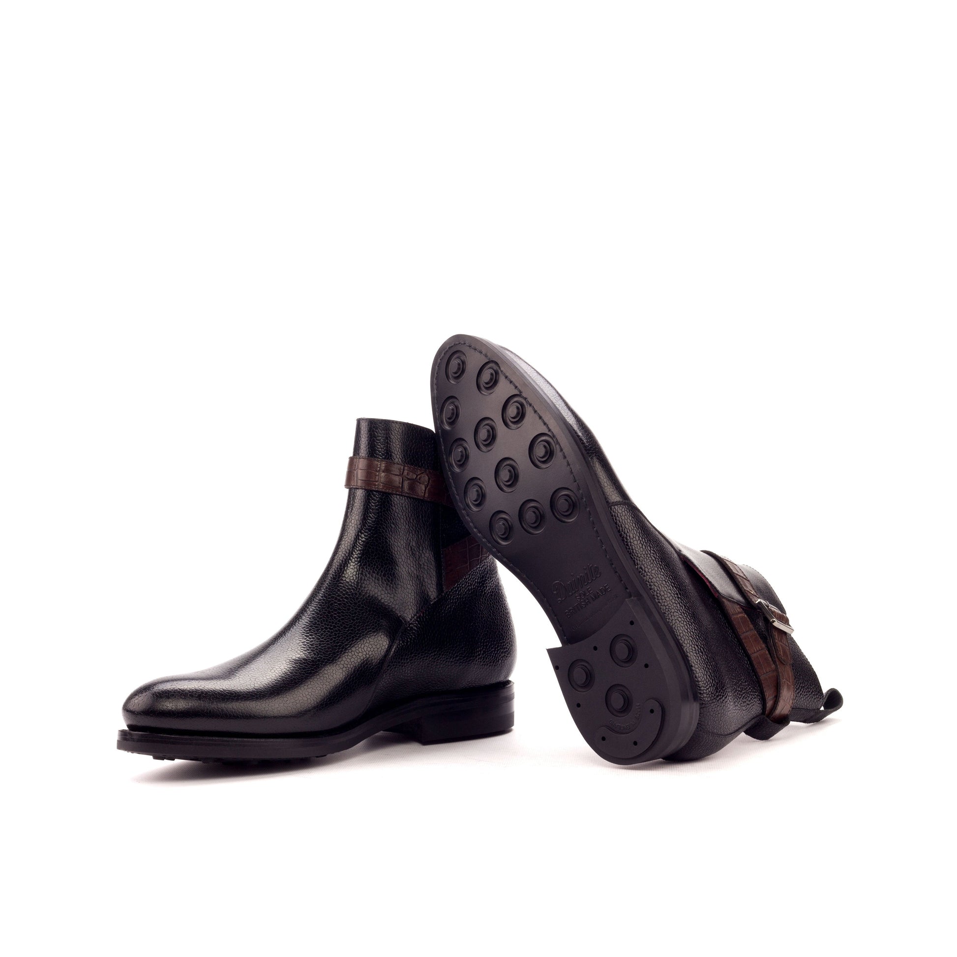Jodhpur Boot in Black Painted Pebble-Grain Box Calf and Dark Brown Painted Croco-Embossed Box Calf showing black dainite rubber sole