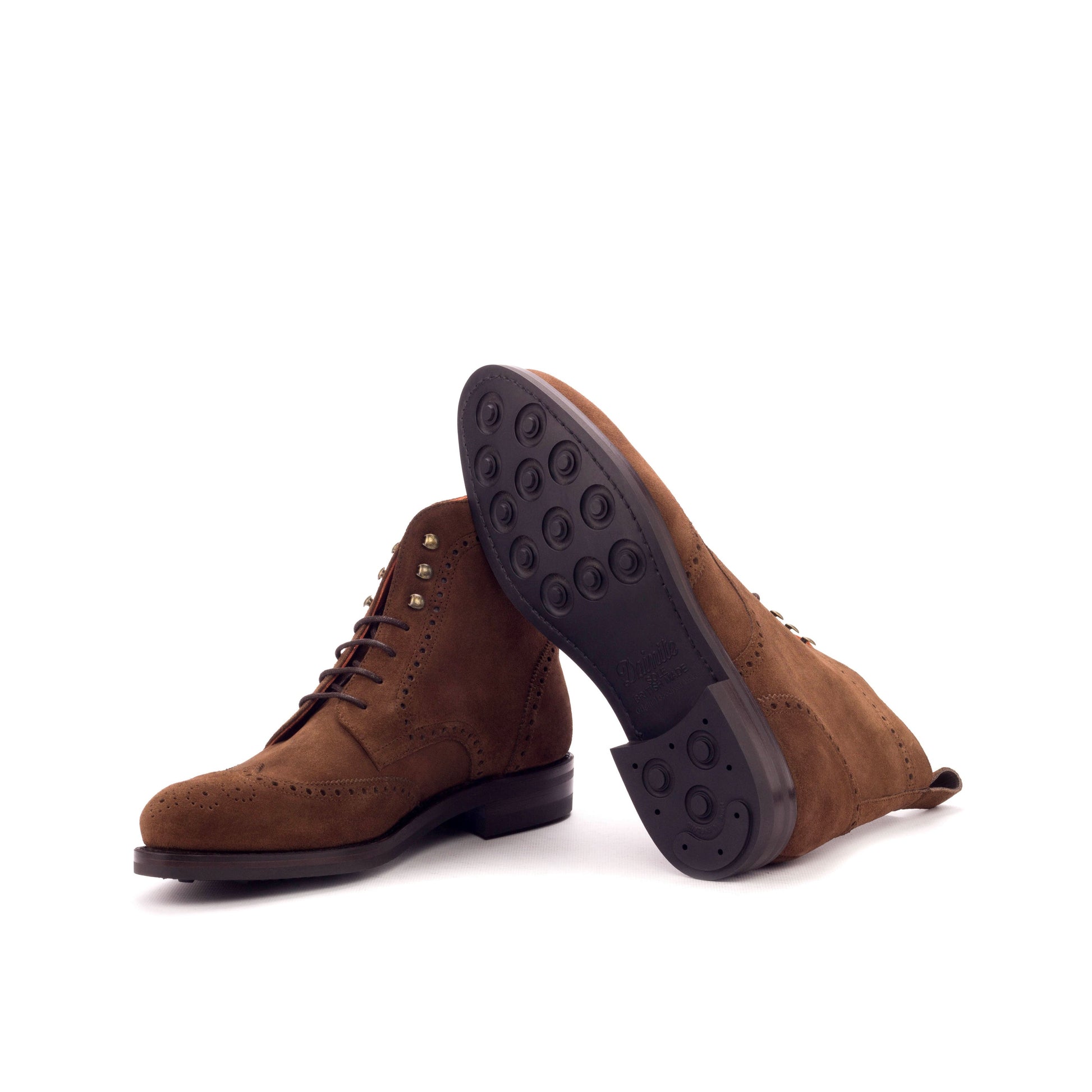 Wingtip Boot in Medium Brown Lux Suede showing black dainite rubber sole