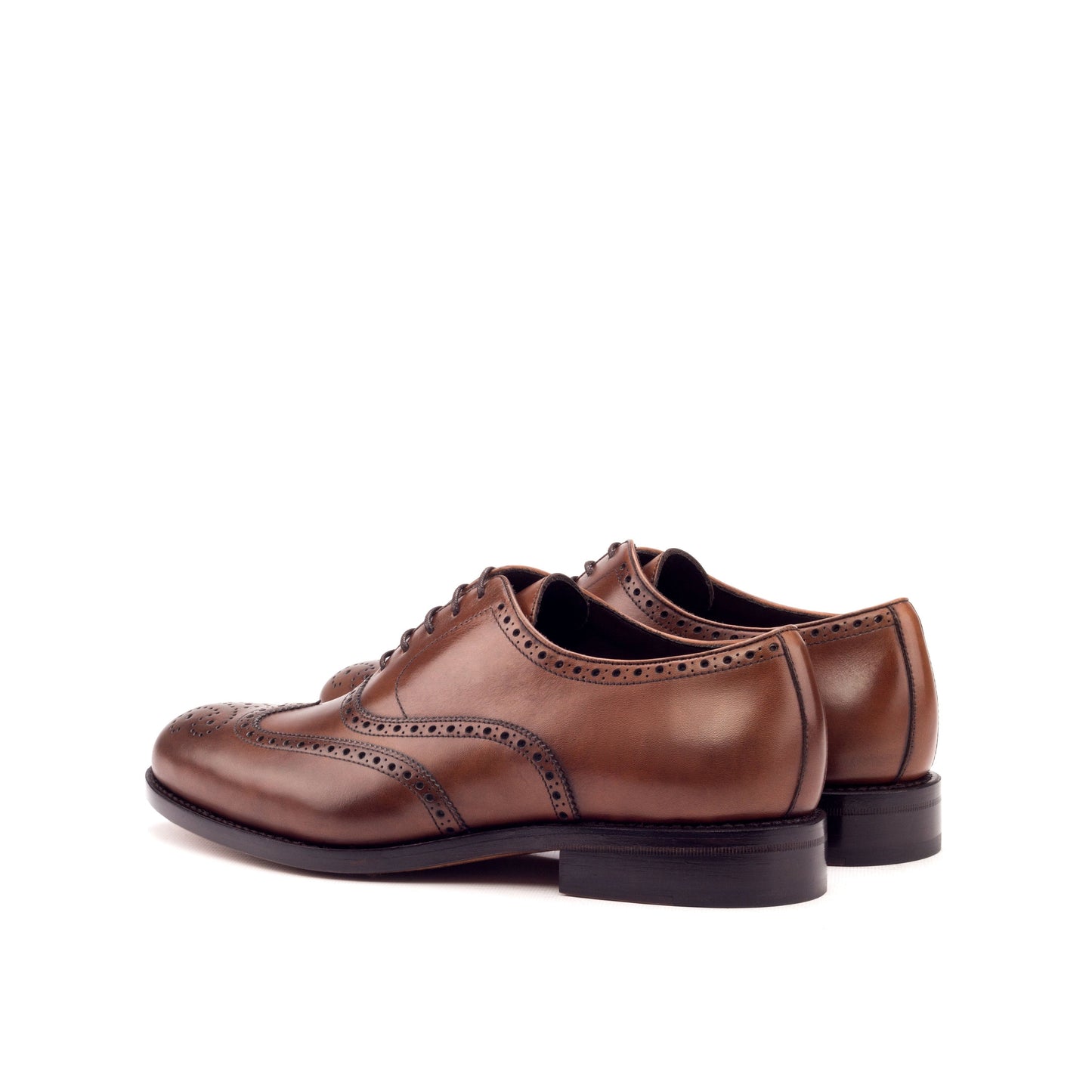 Medium brown painted calf wingtip Oxfords, rear three-quarter view