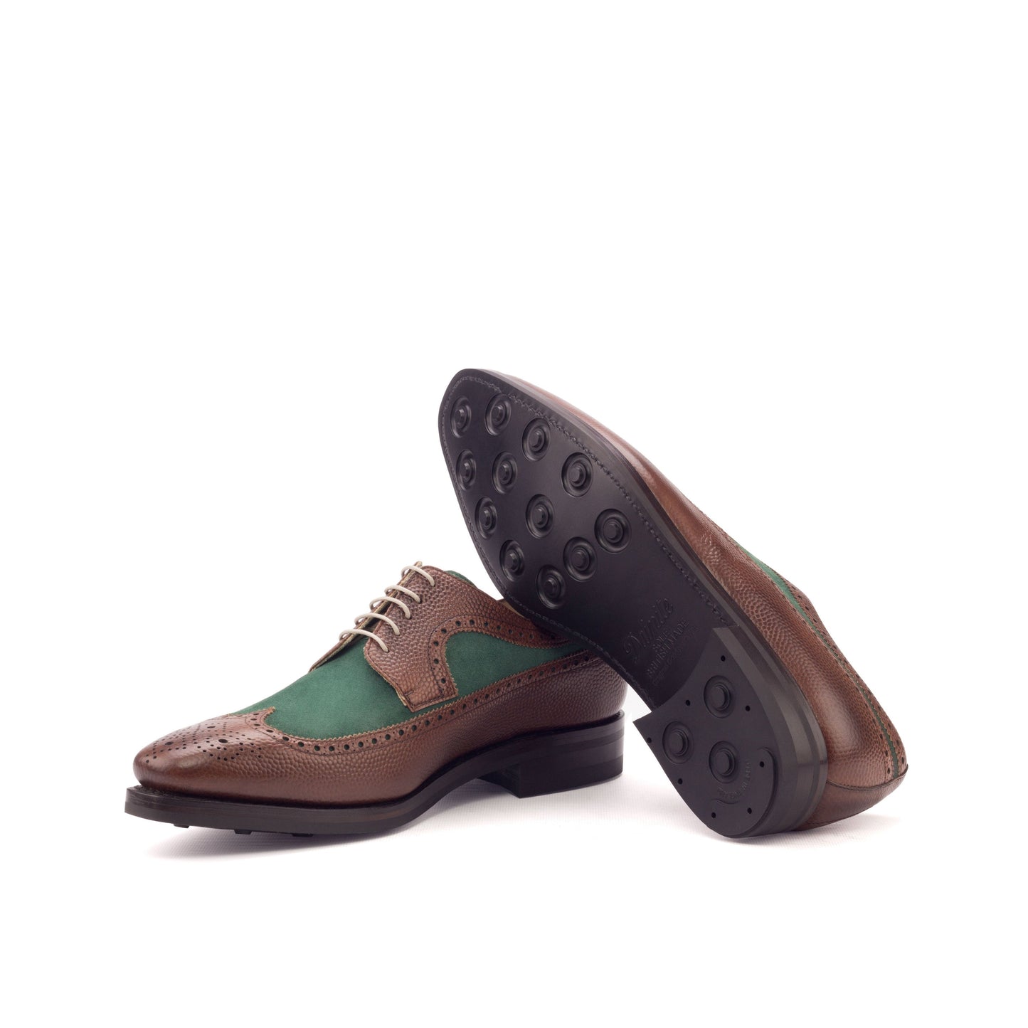 Long Wingtip Derby in Medium Brown Painted Pebble-Grain Box Calf and Forest Green Kid Suede showing black dainite rubber sole