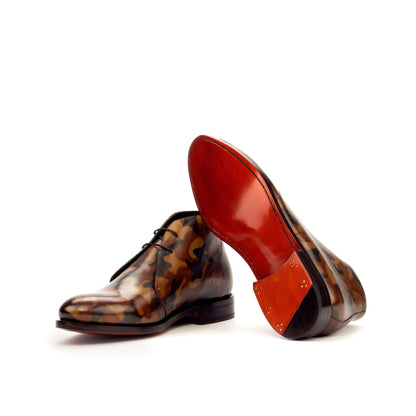 Chukka Boot in Brown Camo Patina Box Calf showing cognac leather sole