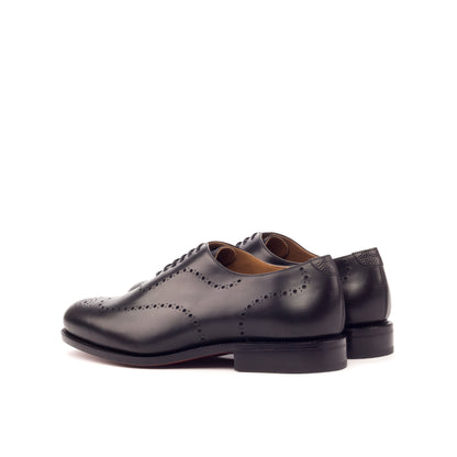 Wholecut Oxford in Black Box Calf and Black Painted Pebble-Grain Box Calf, rear three-quarter view