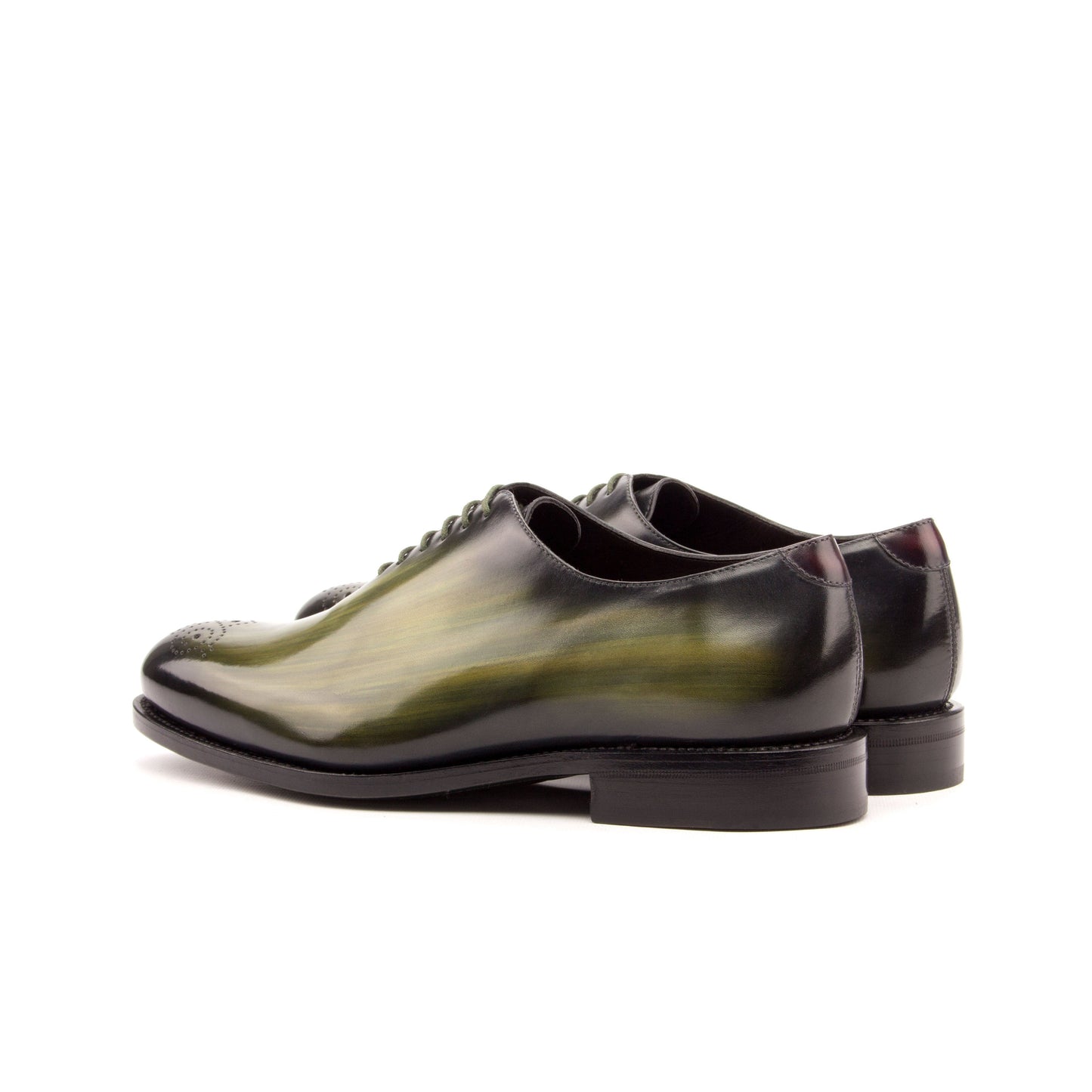 Wholecut Oxford in Khaki Patina Box Calf and Burgundy Patina Box Calf showing forest green leather sole