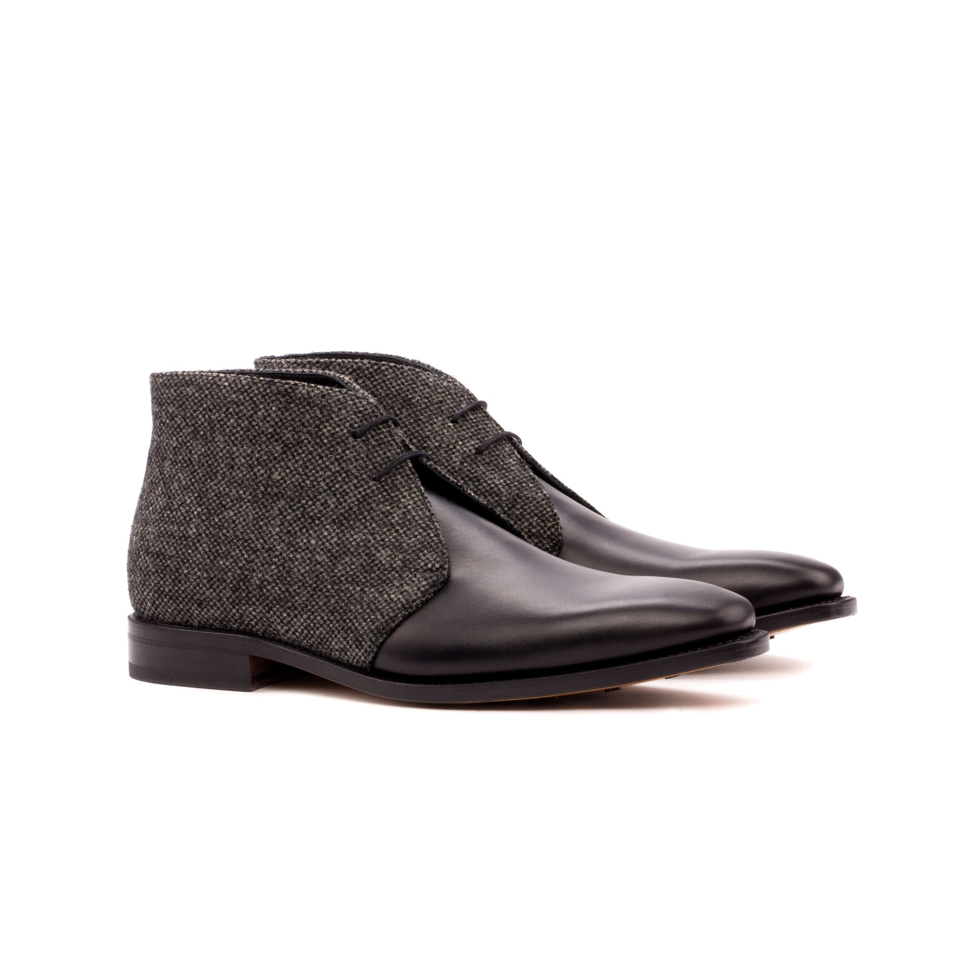 Chukka Boot in Black Box Calf and Black Nailhead Fabric, front three-quarter view