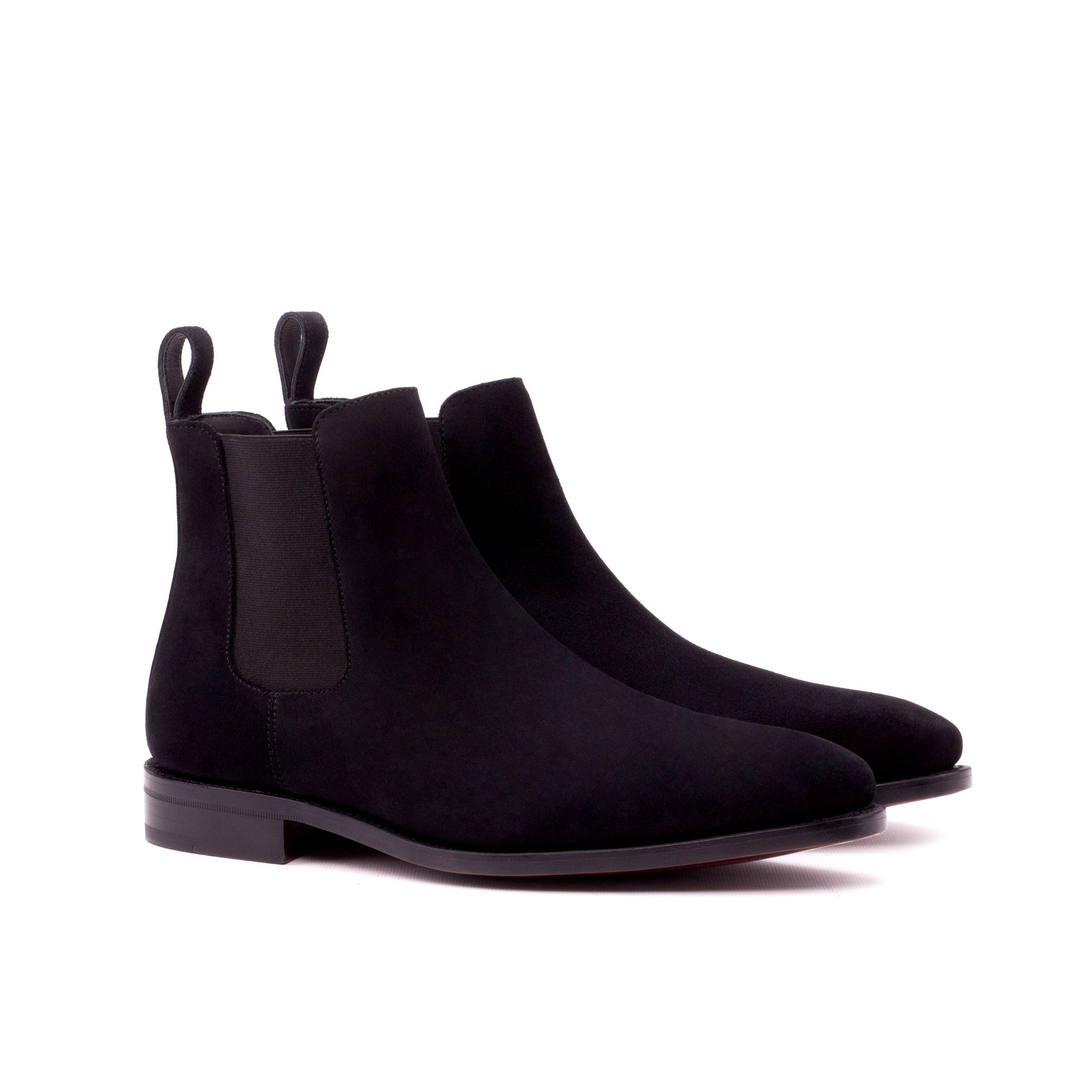 Pair of black Lux Suede Chelsea boots with black elastic gussets, front three-quarter view