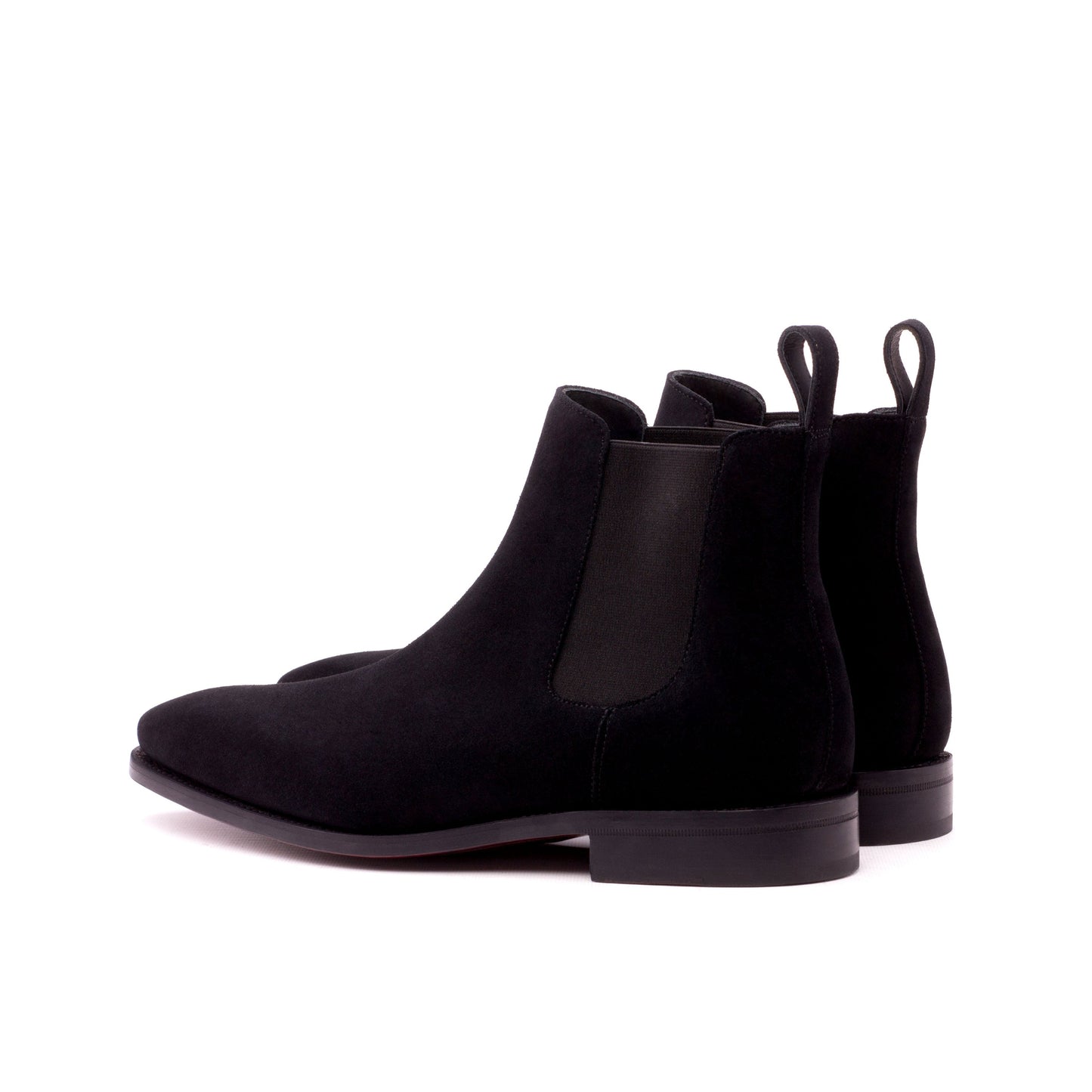 Black Lux Suede Chelsea boots with matching pull tabs, rear three-quarter view