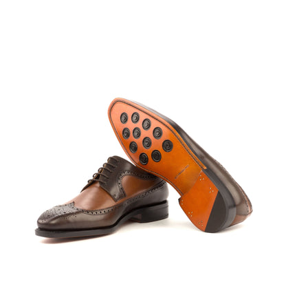 Long Wingtip Derby in Dark Brown Painted Box Calf and Medium Brown Painted Box Calf showing cognac leather sole with rubber button injections