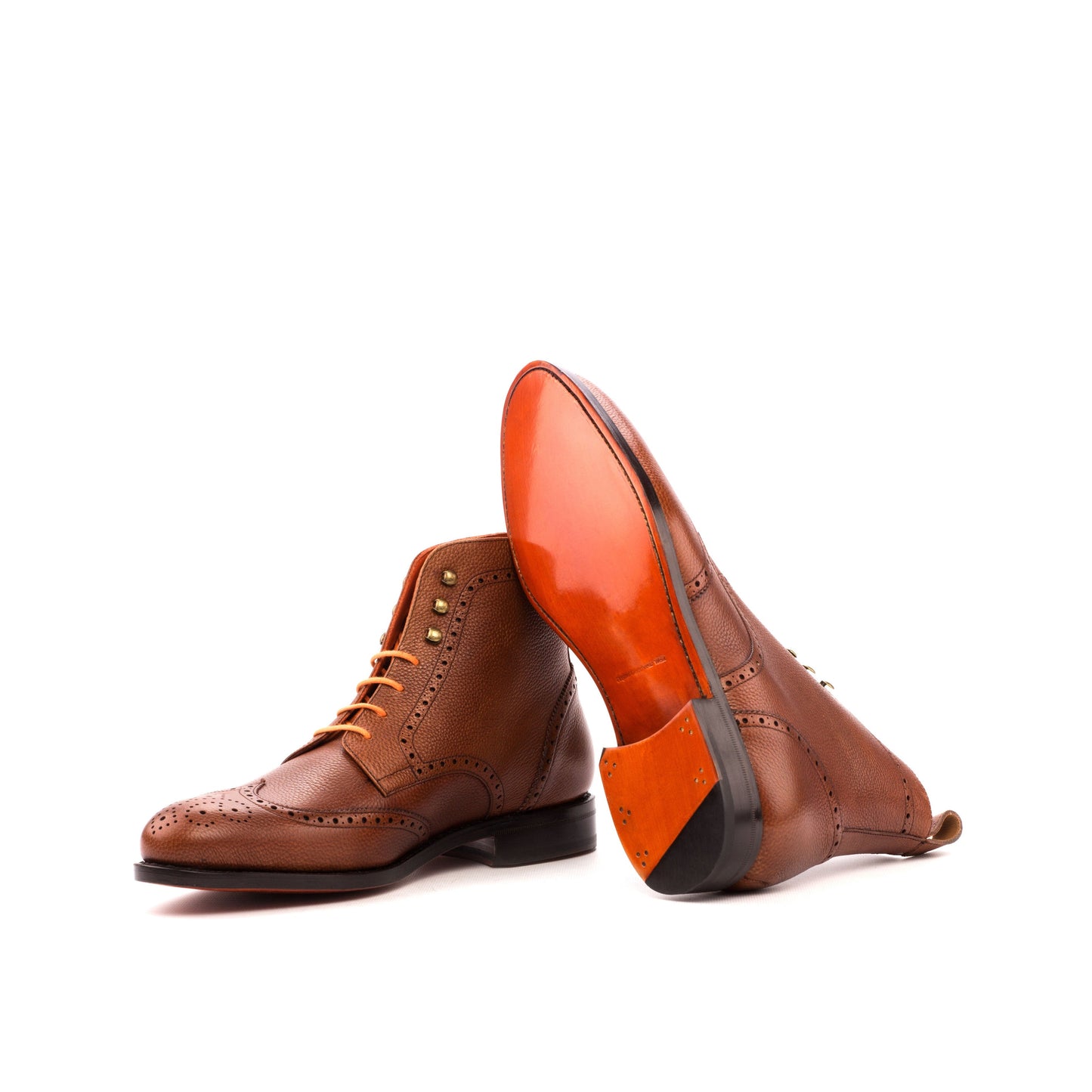 Wingtip Boot in Medium Brown Painted Full-Grain Box Calf showing cognac leather sole