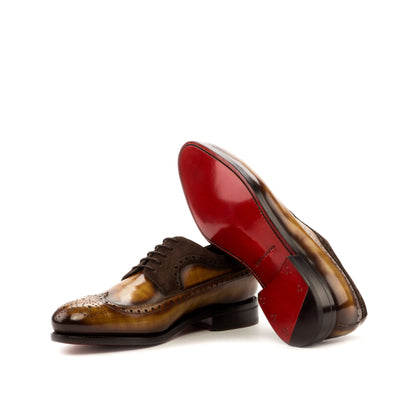 Long Wingtip Derby in Cognac Patina Box Calf and Brown Kid Suede showing red leather sole
