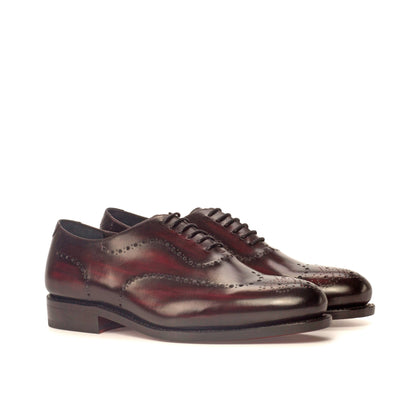 Wholecut Oxford in Burgundy Patina Box Calf and Black Box Calf, front three-quarter view