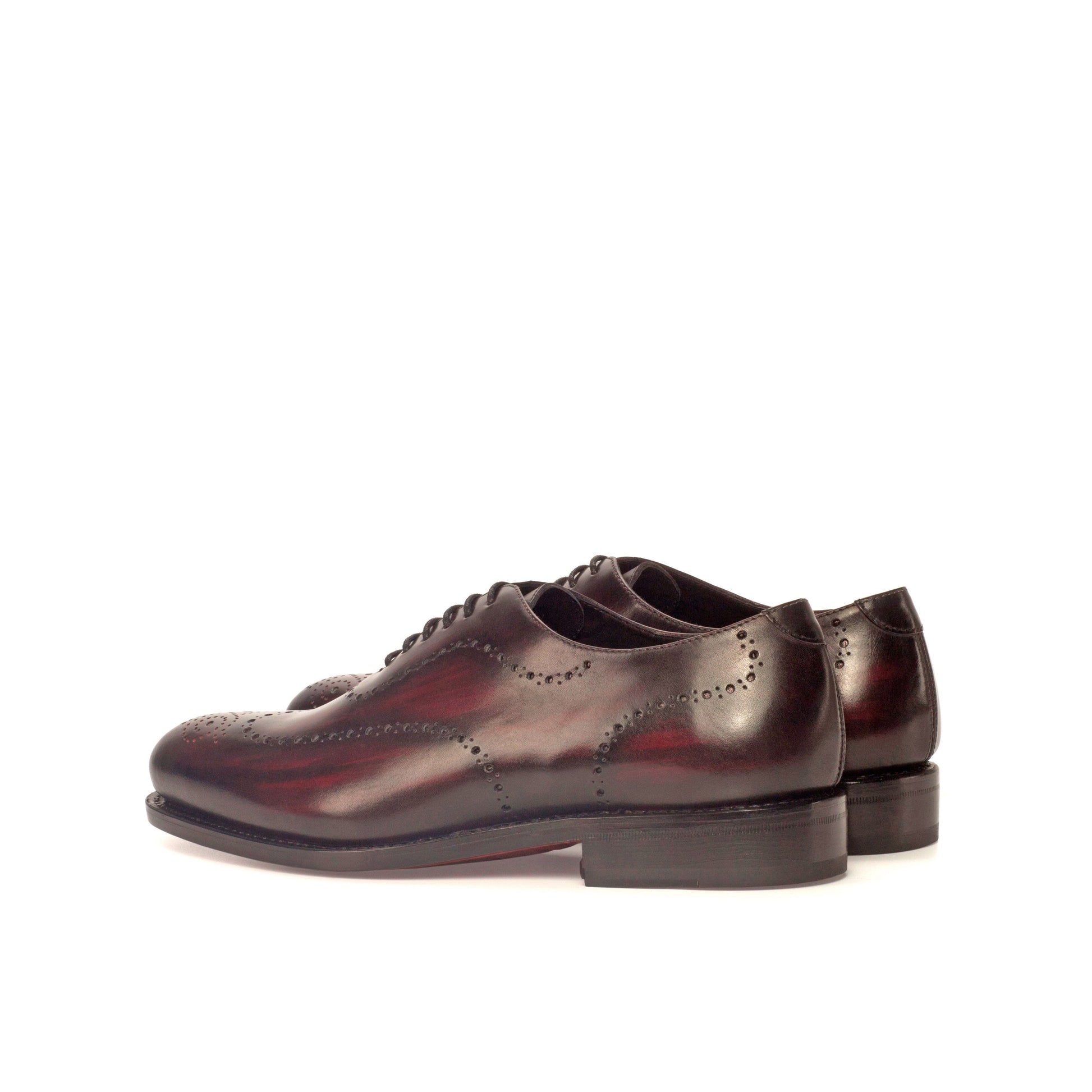 Wholecut Oxford in Burgundy Patina Box Calf and Black Box Calf, rear three-quarter view