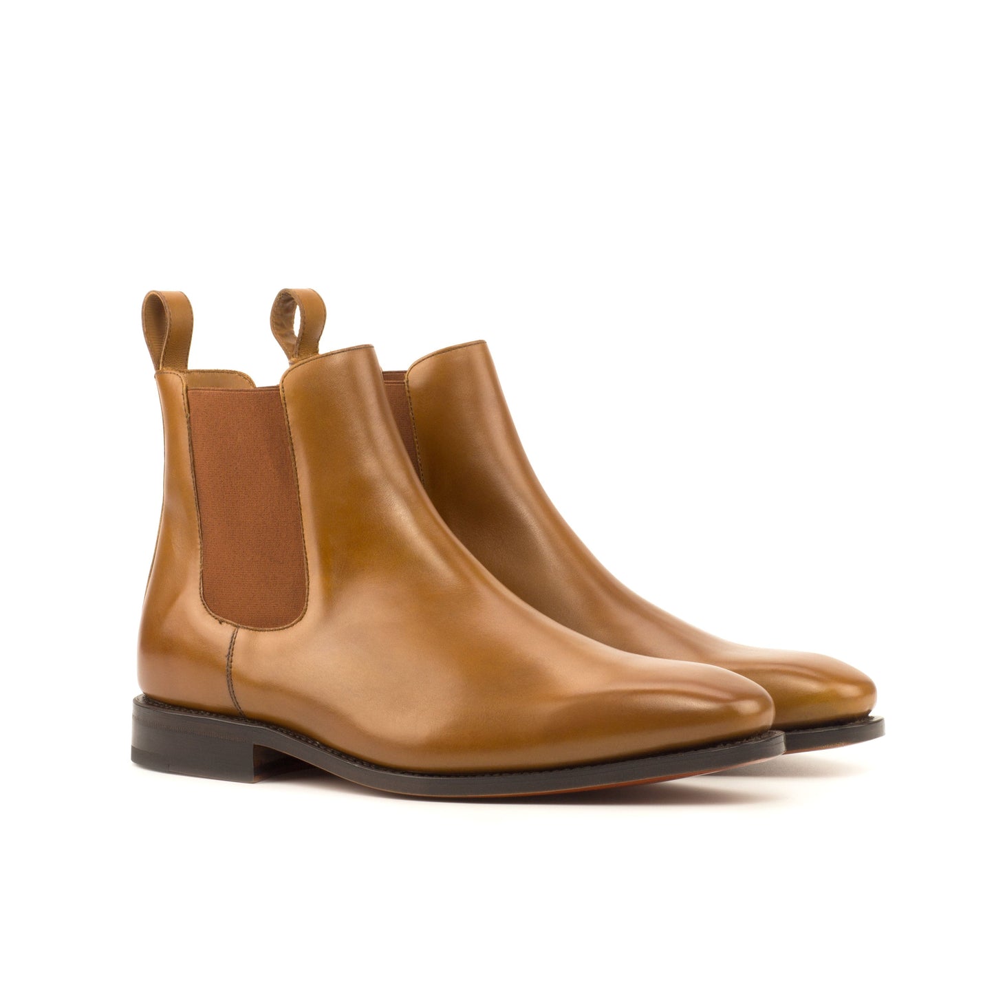 Pair of cognac box calf Chelsea boots with cognac elastic gussets, front three-quarter view
