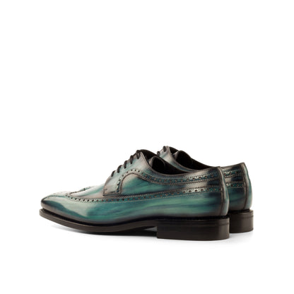 Long Wingtip Derby in Turquoise Patina Box Calf, rear three-quarter view