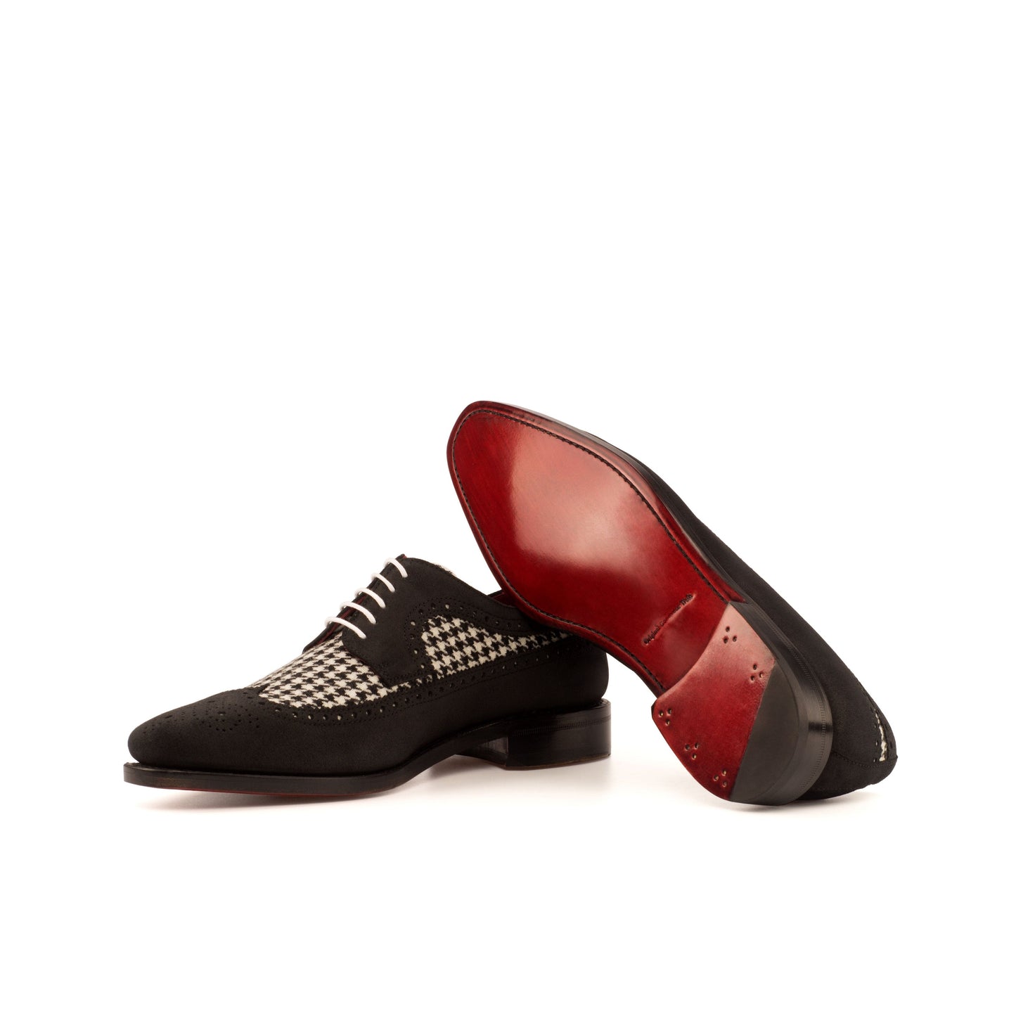 Long Wingtip Derby in Black Lux Suede and Black and White Houndstooth Fabric showing red leather sole
