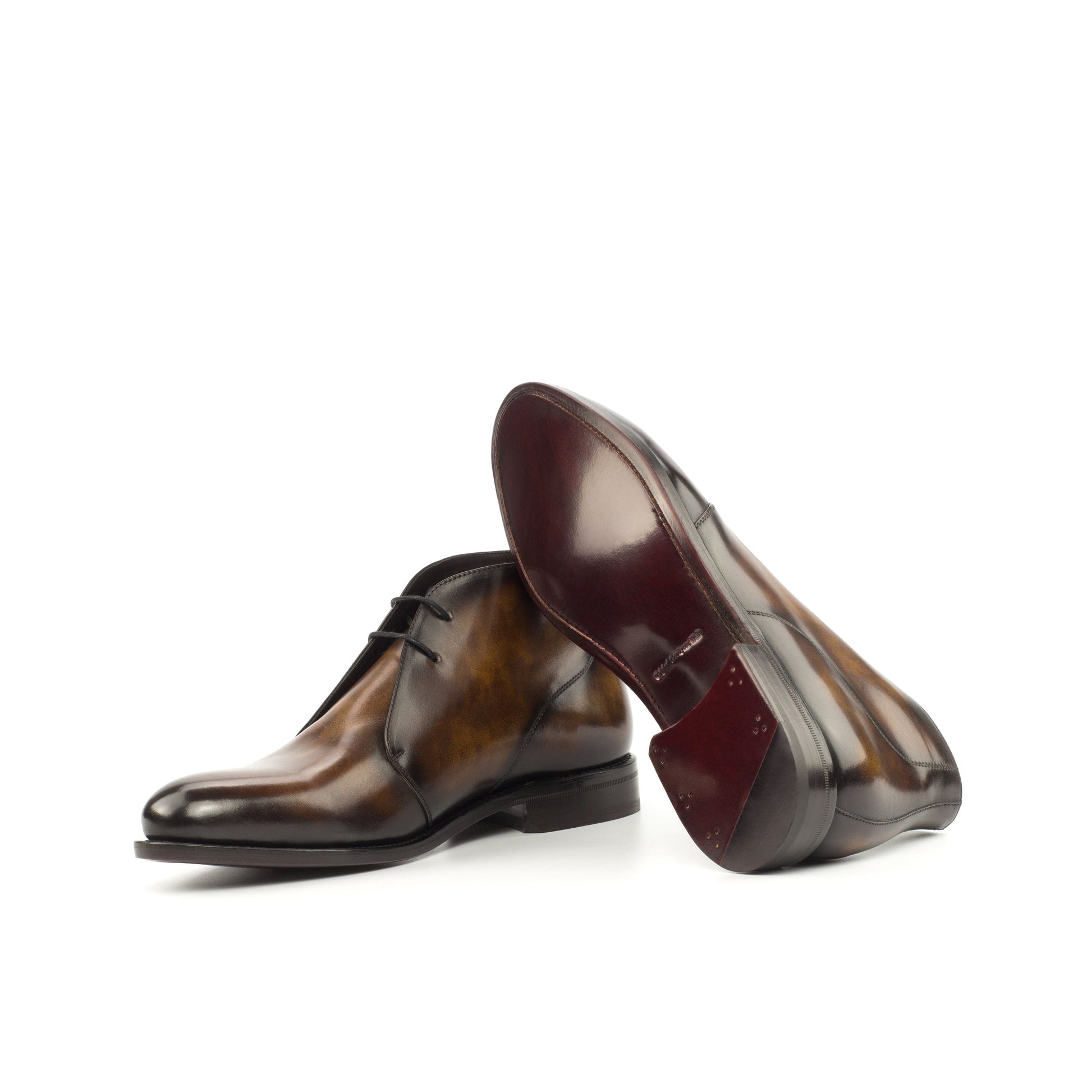 Chukka Boot in Tobacco Museum Patina Box Calf showing dark red leather sole