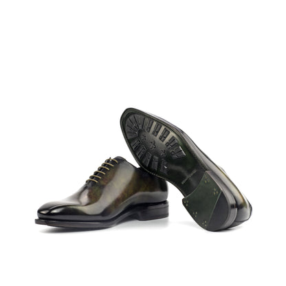 Wholecut Oxford in Green Museum Patina Box Calf showing forest green leather sole with mountain rubber injections