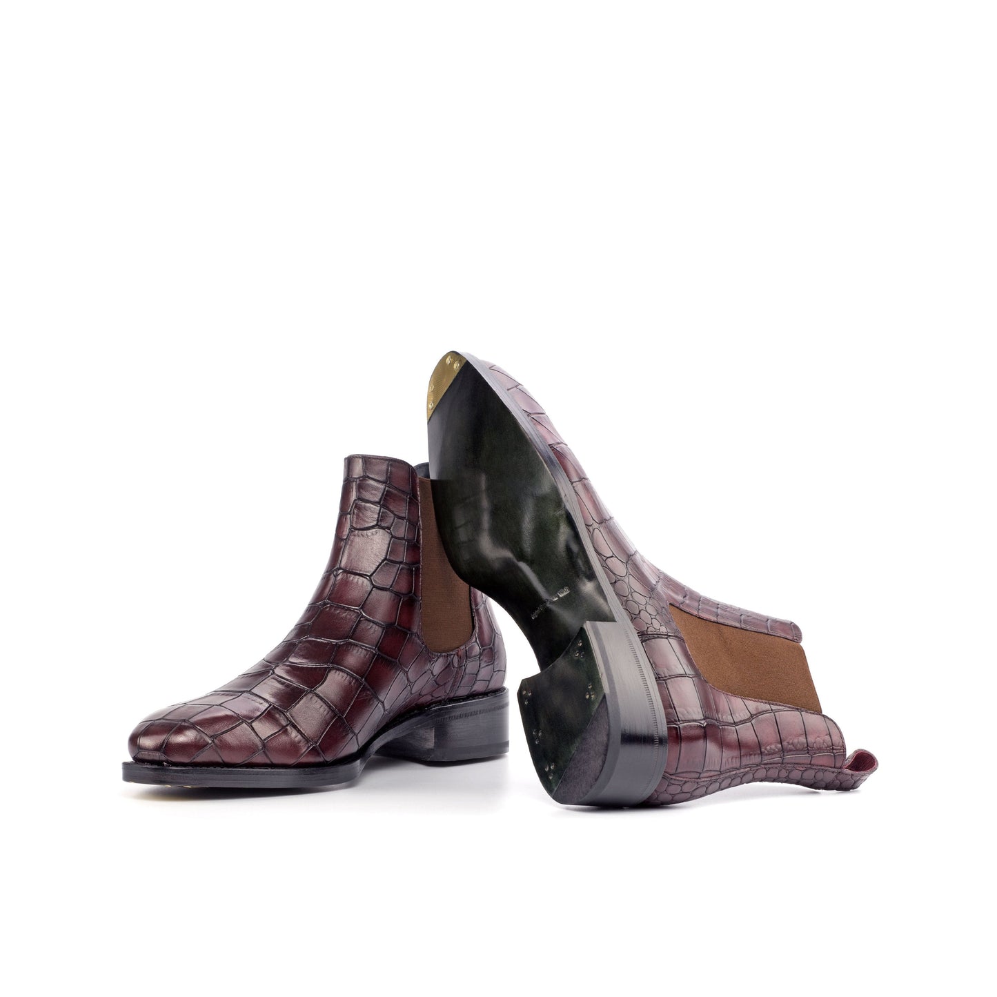 Burgundy painted croco-embossed box calf Chelsea boots showing forest green beveled-waist leather soles