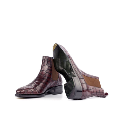 Burgundy painted croco-embossed box calf Chelsea boots showing forest green beveled-waist leather soles