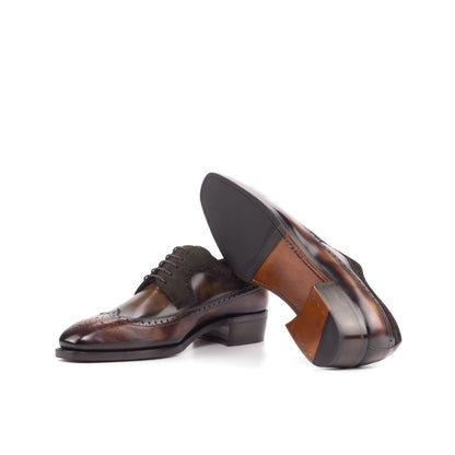 Long Wingtip Derby in Fire Museum Patina Box Calf and Brown Patina Box Calf showing cognac leather and rubber combination sole