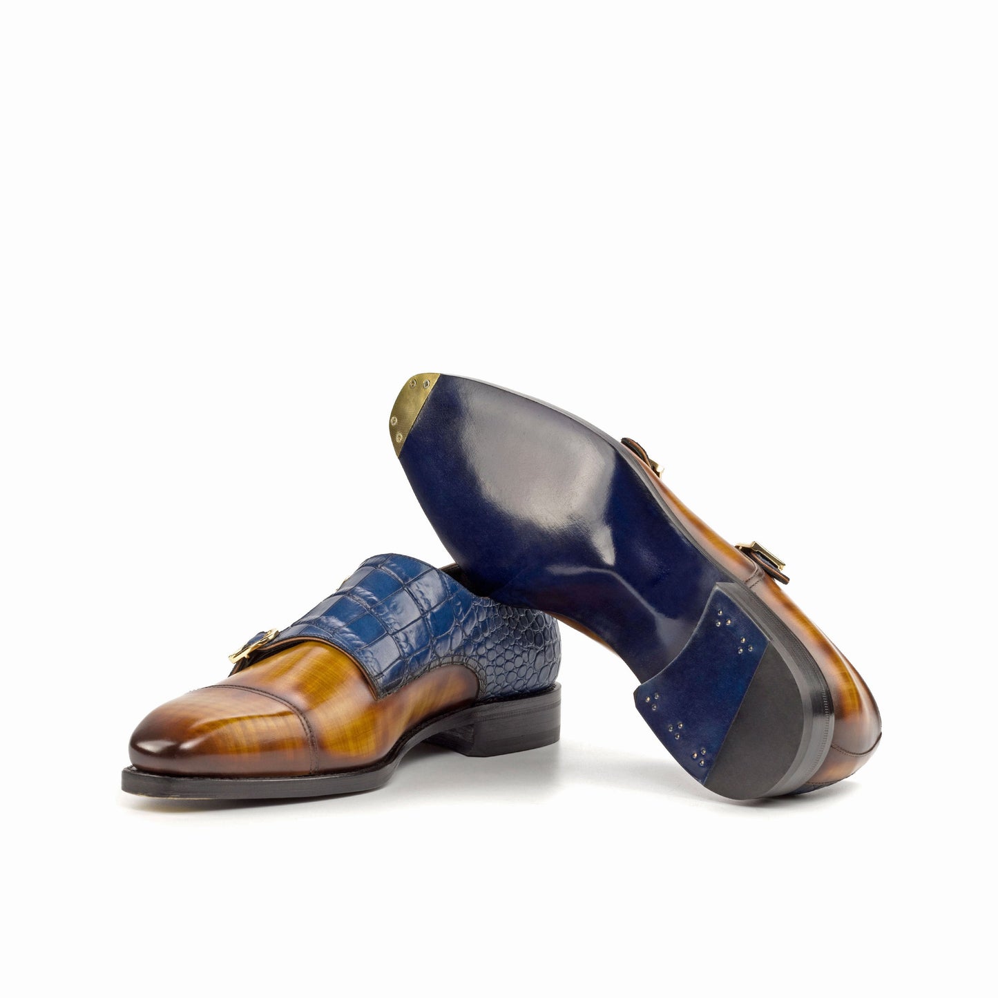 Double Monk Strap in Cognac Patina Box Calf and Navy Painted Croco-Embossed Box Calf showing ultramar leather sole with a bevelled waist