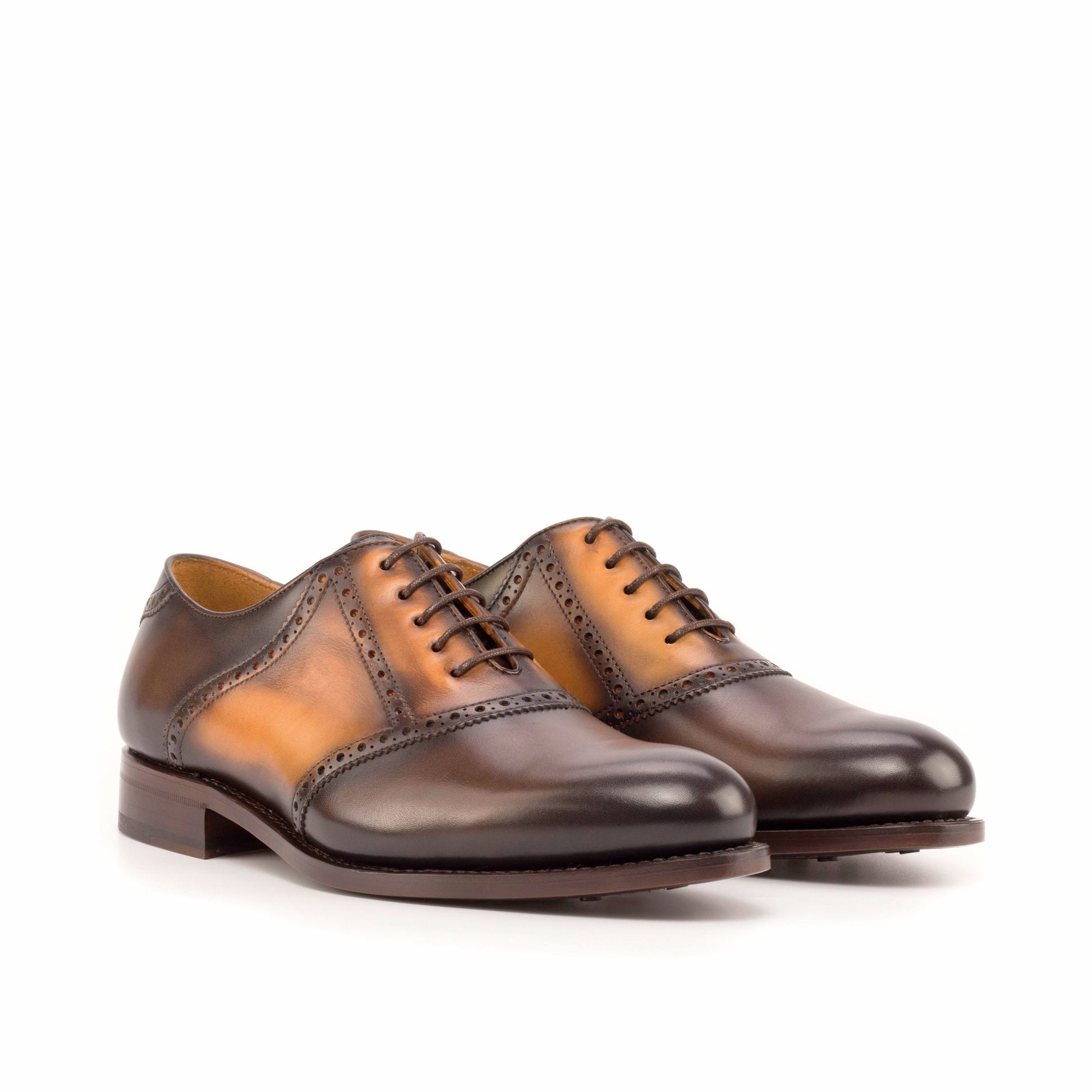 Saddle Shoe in Burnished Dark Brown Painted Box Calf and Burnished Cognac Painted Box Calf, front three-quarter view