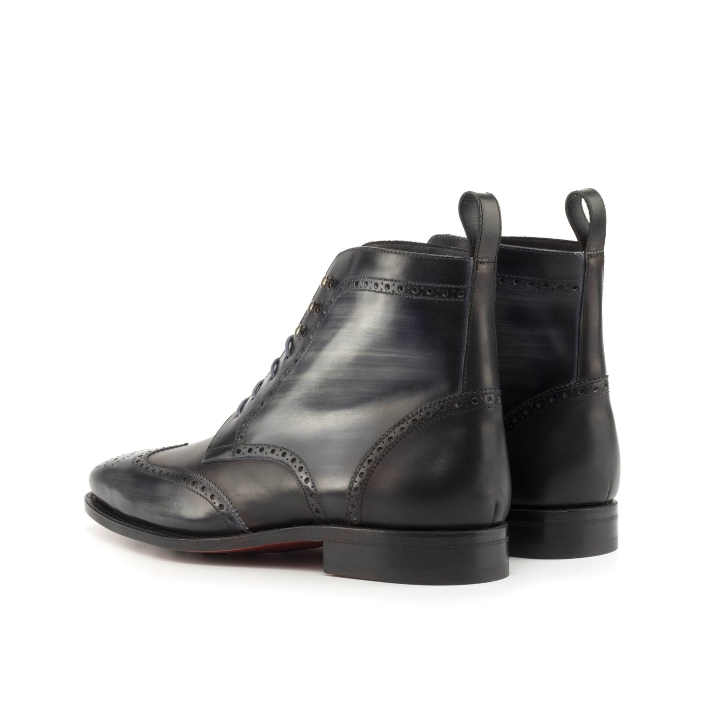 Wingtip Boot in Grey Patina Box Calf and Black Box Calf, rear three-quarter view