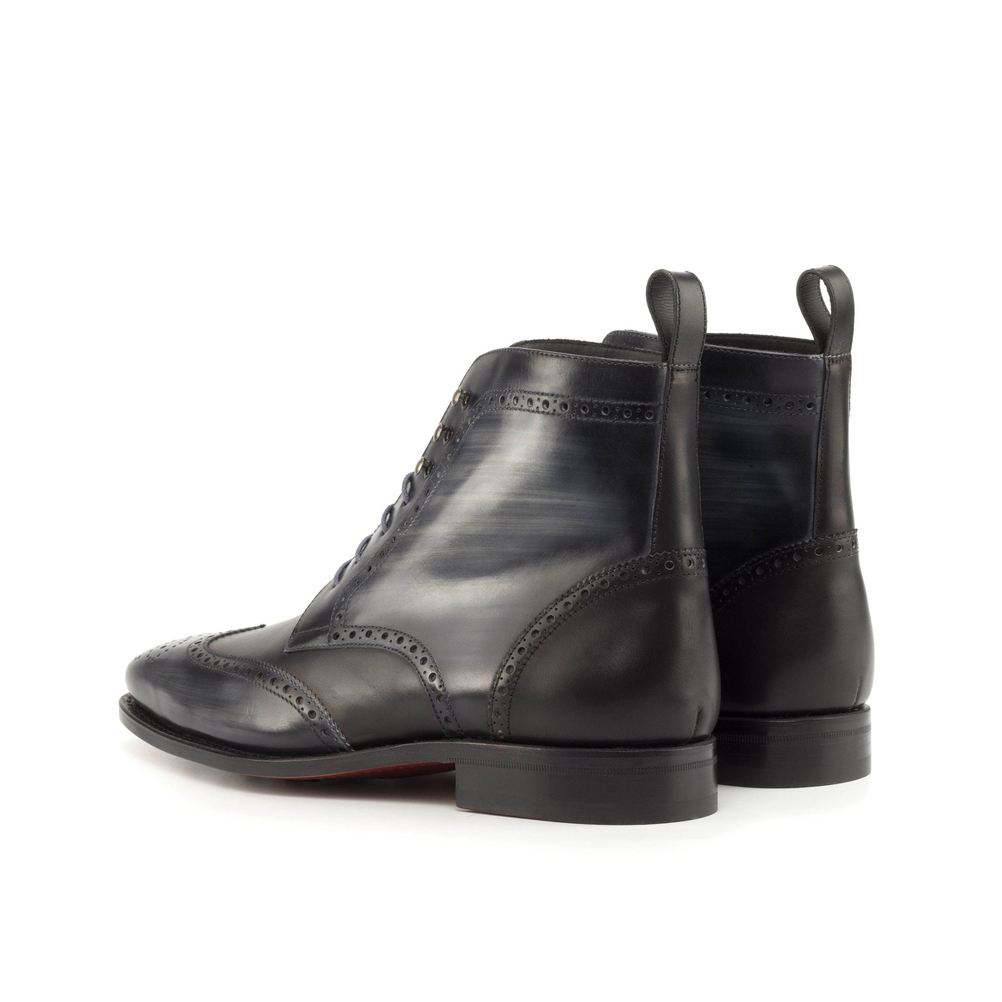 Wingtip Boot in Grey Patina Box Calf and Black Box Calf, rear three-quarter view