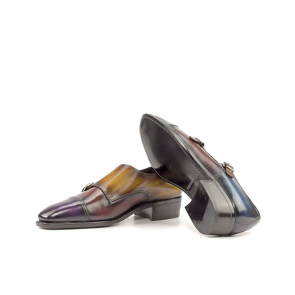 Double Monk Strap in Purple Patina Box Calf and Burgundy Patina Box Calf showing black leather sole