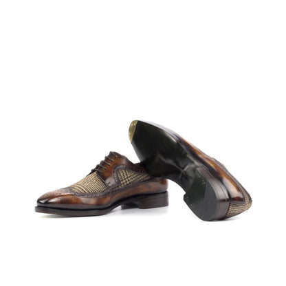 Long Wingtip Derby in Fire Museum Patina Box Calf and Brown Wool Tweed showing forest green leather sole with a bevelled waist