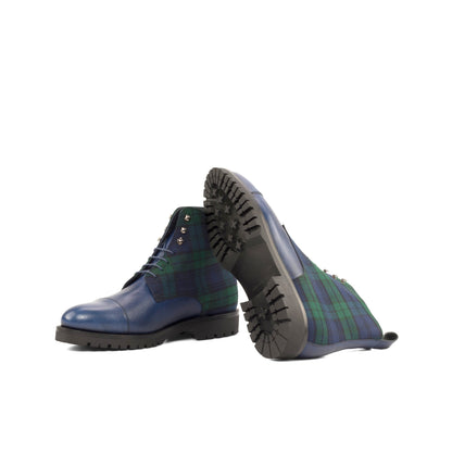 Jumper Boot in Blackwatch Wool and Navy Painted Full-Grain Box Calf showing black commando rubber sole