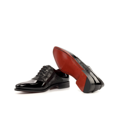 Saddle Shoe in Black Patent Leather and Black Painted Croco-Embossed Box Calf showing red leather sole