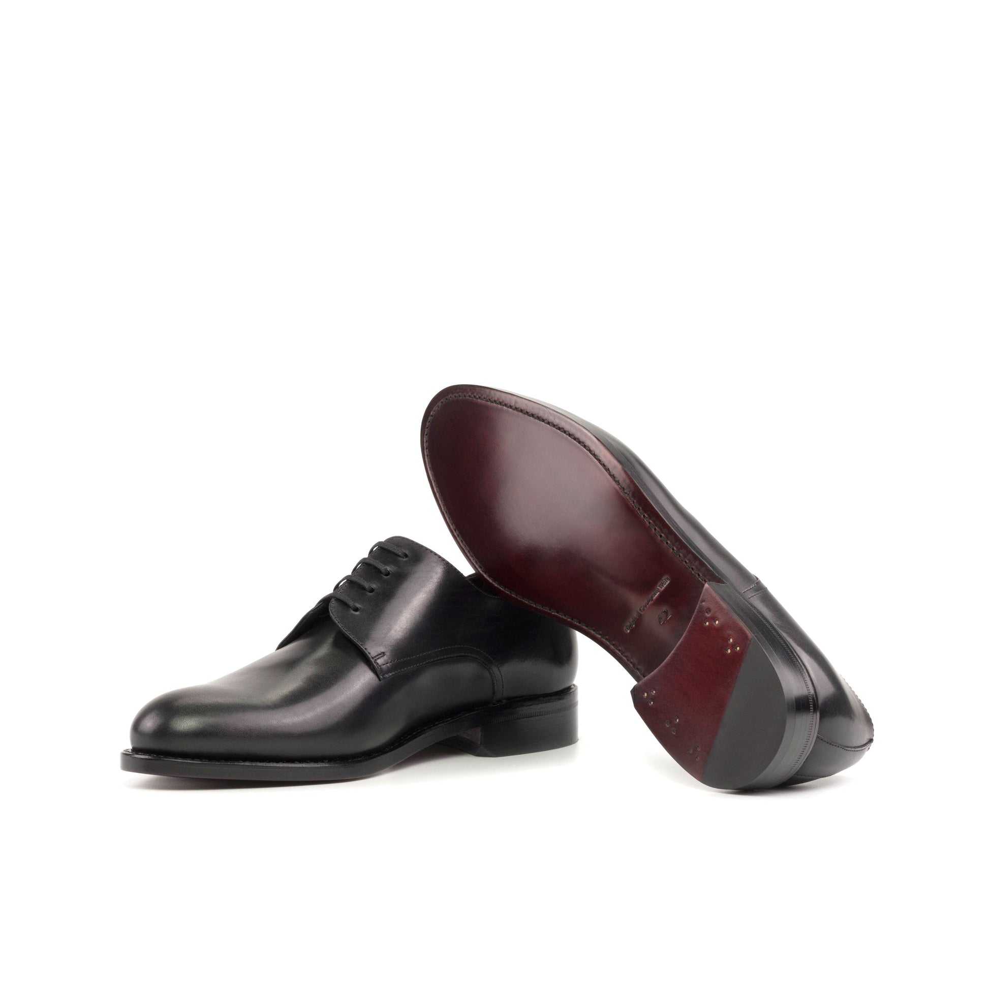 Derby in Black Box Calf showing dark red leather sole