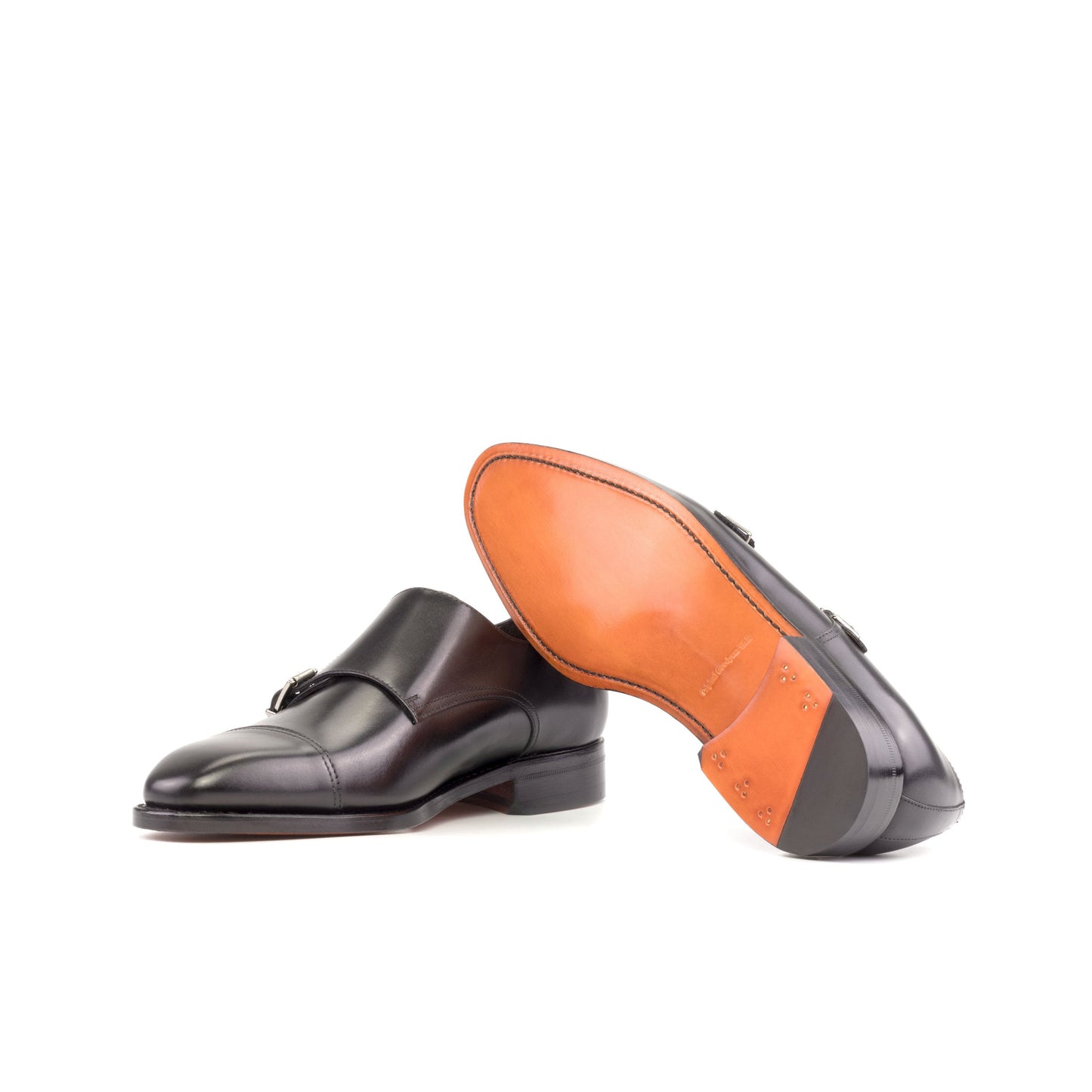 Double Monk Strap in Black Box Calf showing orange leather sole