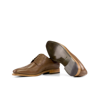 Long Wingtip Derby in Light Brown Painted Box Calf showing forest green leather sole
