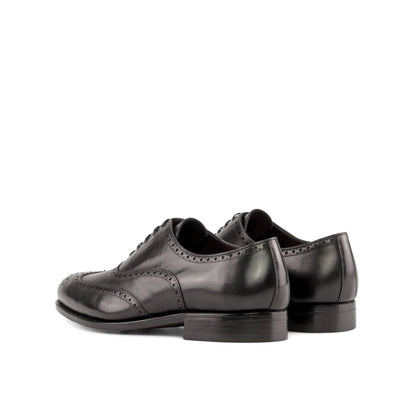 Wingtip Oxford in Black Box Calf, rear three-quarter view