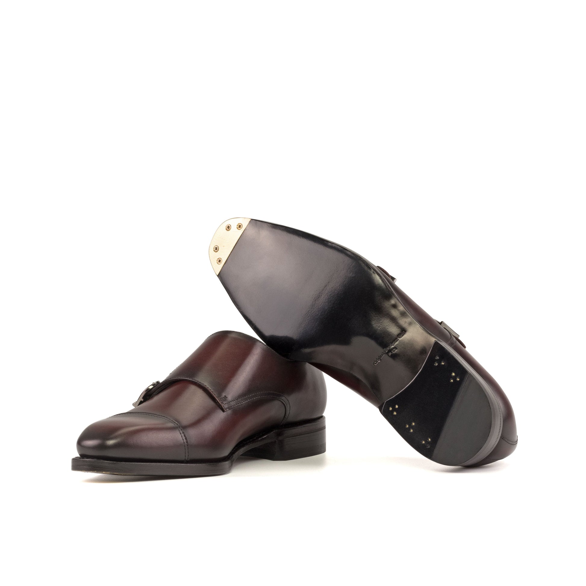 Double Monk Strap in Burnished Burgundy Box Calf showing black leather sole with a bevelled waist