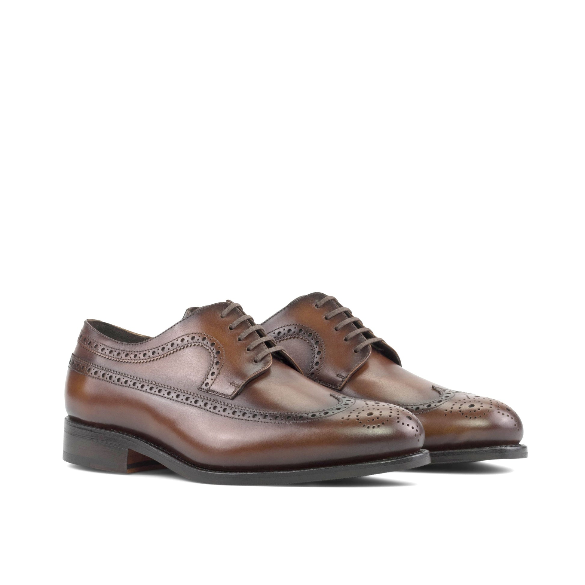 Long Wingtip Derby in Burnished Dark Brown Box Calf, front three-quarter view