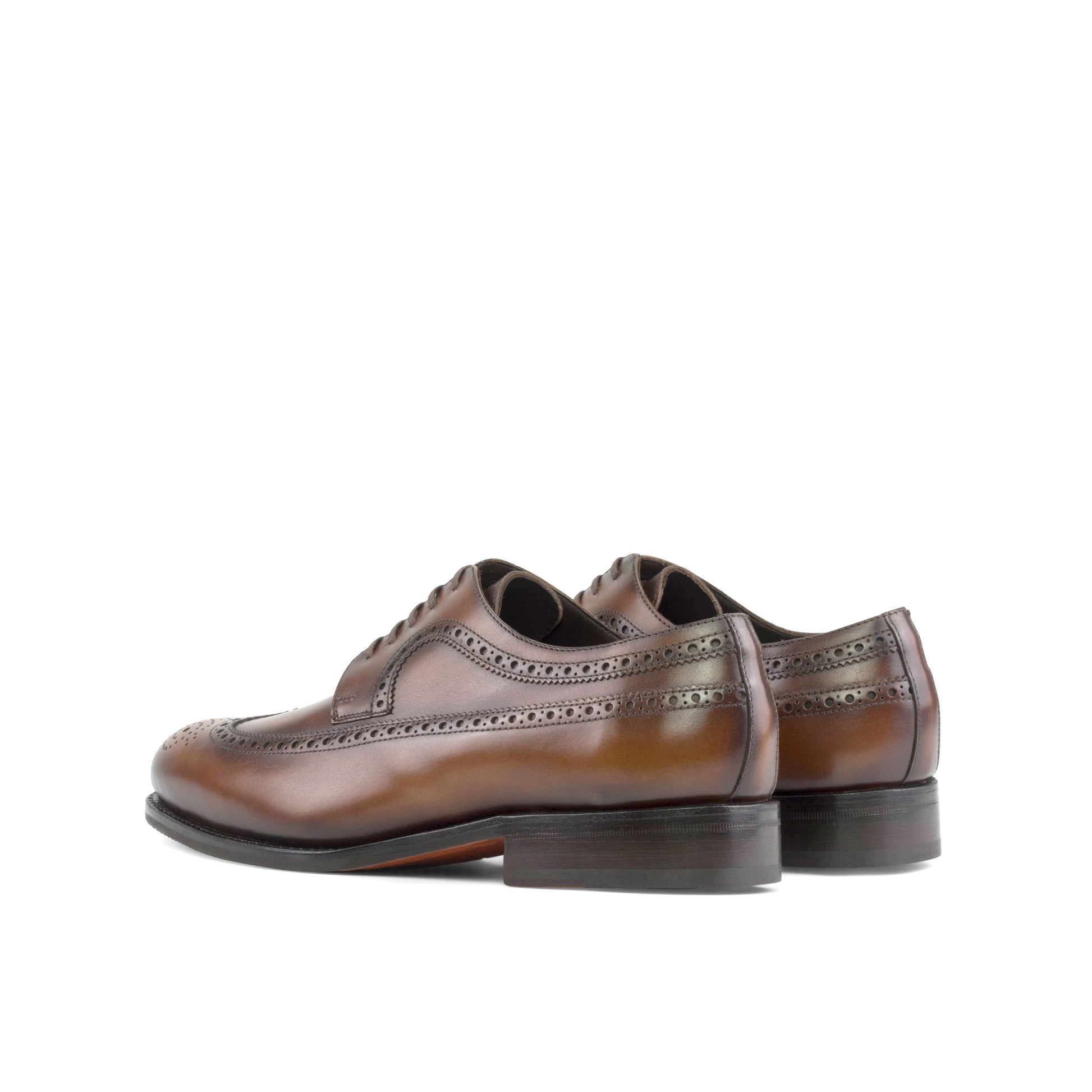 Long Wingtip Derby in Burnished Dark Brown Box Calf, rear three-quarter view