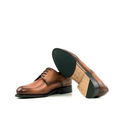 Derby in Cognac Painted Box Calf showing natural leather sole
