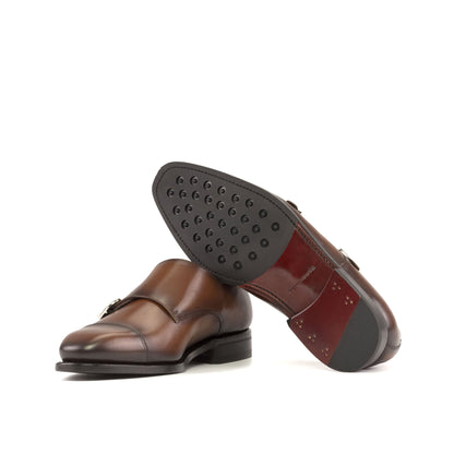 Double Monk Strap in Burnished Burgundy Painted Box Calf and Burnished Burgundy Box Calf showing dark red leather sole with rubber dot injections