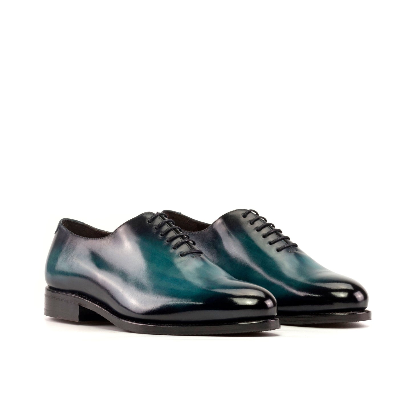 Wholecut Oxford in Turquoise Patina Box Calf, front three-quarter view